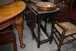 A period oak gateleg dining table, width approx. 102cm