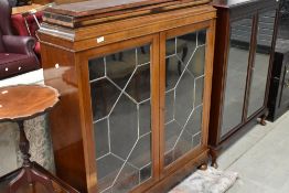 An early 20th Century mahogany glazed display cabinet, width approx. 107cm