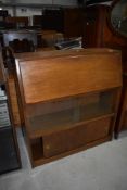 A vintage sapele bookcase with double bookcase under, width approx. 91cm