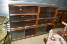 A pair of vintage dark oak office style stacking bookcases, with sliding doors, each width approx.
