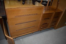 A selection of vintage golden oak bedroom furniture comprising bed head drawers and bedroom