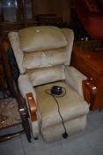 A vintage electric recliner easy chair