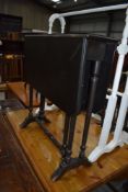 A Victorian ebonised Sutherland style table, width approx. 62cm