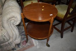 A vintage circular tea trolley