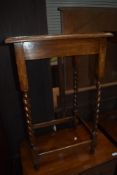 An early 20th Century oak occasional table of barley twist legs, approx. 47 x 37cm