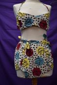 A collectable 1950s Jantzen bikini, having wonderful bright leaf pattern. Comprising of halter
