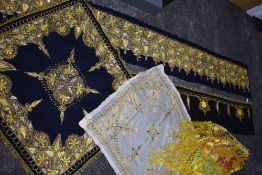 A collection of wool panels having heavy and extensive metal embroidery and silk thread design on