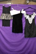 Three 1980s evening dresses,including off shoulder dress in black velvet,smaller sizes.