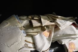 A selection of vintage and antique table linen.