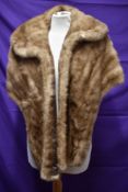 A 1950s honey blonde mink stole with large collar detail to front, monogrammed to inside with J.E.