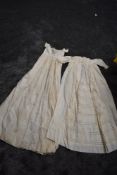 Two extensively embroidered christening gowns, with lace details throughout.some age staining.