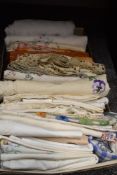 A large collection of vintage table linen, a lot having bright embroidery and some with crotchet
