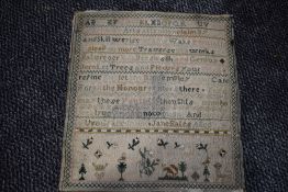 An antique embroidery sampler by Jane Bates,dating to 1791,loosely mounted on board, some wear in