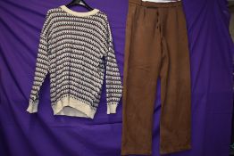 A pair of vintage 1950s gents button fly wool trousers in brown and a retro Laxey woolen mill