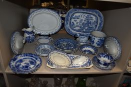 A selection of blue and white wear ceramics including Spode bowls and Cauldon cake plates