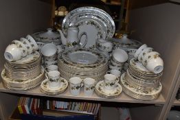 A Royal Doulton Larchmont part dinner service including dinner plates,side plates,cups and saucers,