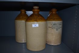 Three earthenware advertising bottles, of Bolton,Accrington, Blackpool and similar areas.