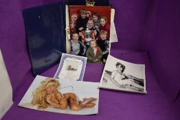 A signed nude photograph of Pamela Anderson with authenticity certificate,Julie Newmar signed