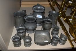 A selection of pewter tavern or pub tankards some bearing touch marks