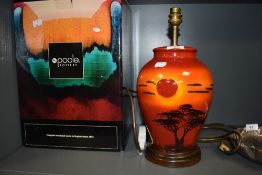 A Poole pottery ceramic lamp in the Ginger Jar design with African Savannah scenes boxed
