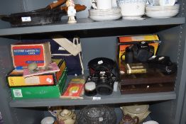 A selection of photographic and camera equipment including Nikon M90 film camera and Canon EOS 100