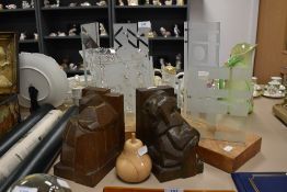 A collection of decorative wood and glass items.