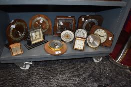 A selection of early plastic and Art Deco styled mantle alarm and travel clocks including Temco ,