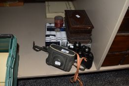 A selection of items including Milo binoculars, vintage Kodak camera, stud box, handkerchiefs, and a