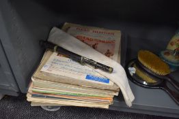 A selection of piano and sheet music also partial mahogany recorder or piccolo body