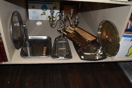 A lot containing a selection of stainless steel trays, toast rack,serving platters and vintage