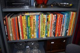 A selection of childrens comic and television annuals including Disneyland, Tiger, and Eagle