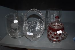 Four pieces of glass,including etched vase,basket and rectangular vase,also a coloured lidded pot.