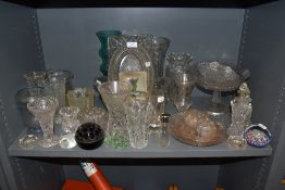 A selection of clear cut and crystal glass wares including aqua blue vase and similar blue example