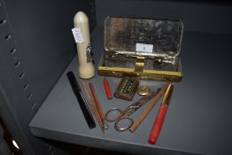 A mixed vintage lot including fountain pens, torch,vesta tin and more.