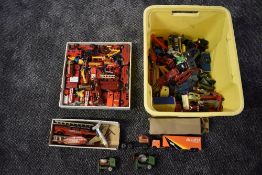 A shelf of mixed vintage playworn and boxed diecast vehicles including Matchbox, Lesney, Ralstoy