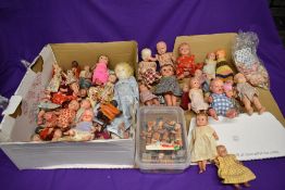 A collection of Kewpie style celluloid dolls, most made in Japan, various sizes but mainly small,