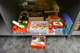 A shelf of modern toys including Big Domino Record, Matchbox Superfast trains and accessories, Toy