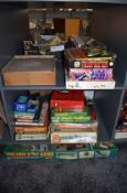 Two shelves of 1970's and later games and toys including Mouse Trap, Cluedo, Frustration,