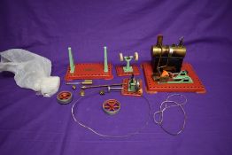 A Mamod live steam plant with brass boiler, polishing wheel and two other part accessories