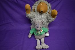 A Burbank Toys Talking Womble, pull cord missing, along with a Russ Standard Rhino soft toy