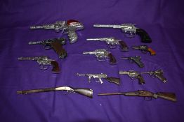 A selection of 1960's and later Toy Cap Guns BCM style Space Outlaw, Crescent Bronco, Lone Star Cody