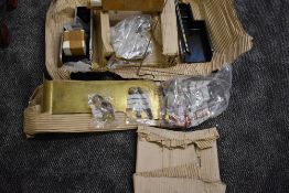 A brass and metal Live Steam Locomotive part kit with badges and nameplates for Maxitrak