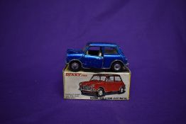 A Dinky diecast, Morris Mini-Minor in metallic blue with white interior, boxed 183 and a Lone Star