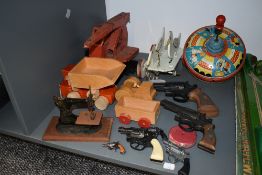 A selection of vintage toys comprising, Tri-ang tin plate Crane and Spinning Top, a childs tin plate