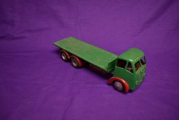 A Shackleton Models Foden FG clockwork ten wheel flatbed delivery truck, having green cab and back