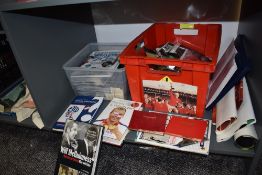 A shelf of modern Sporting Memorabilia including many Premier League Era Bolton Wanderers Matchday