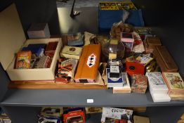 A shelf of mixed vintage Card Games and Puzzles including Grandfathers Whiskers, Lexicon, Old