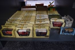 A collection of 46 Matchbox Models of Yesteryear diecast vehicles all in yellow, white, blue and