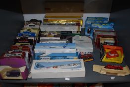 A shelf of modern diecasts including Corgi Austin Metro 275, Corgi Transport of the 30's Bryant &