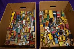A large collection over nine different sized boxes containing Lesney and similar playworn